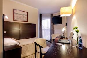 Einzelzimmer im Hotel Aurora Family & SPA mit Schreibtisch und Balkon, Misdroy